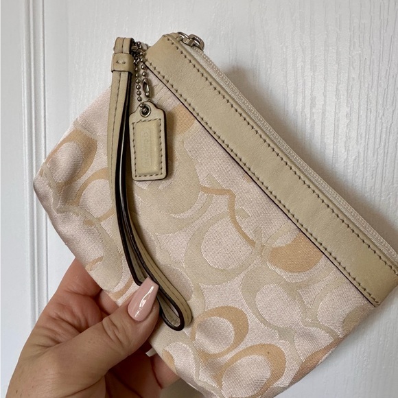 Coach Handbags - Coach Beige and Cream Wristlet with zipper & Leather strap and logo